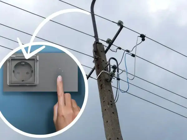 Zastanawiasz się, ile wat wytrzyma kabel 3x1,5? Obrazek pokazuje gniazdko elektryczne i linię energetyczną, sugerując potrzebę wiedzy o obciążeniu przewodów.
